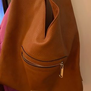 Light brown leather purse by Steve Madden